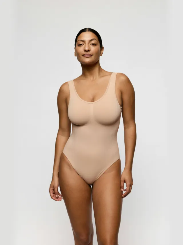 PrimaDonna medium corrigerende body Nudda lichtbeige
