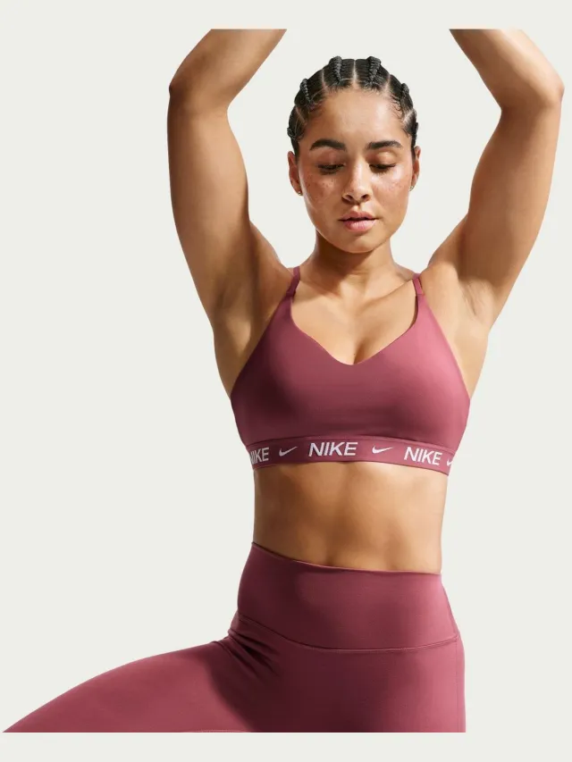 Nike Indy Light Support sportbeha voor dames (Roze rook) Lichtroze