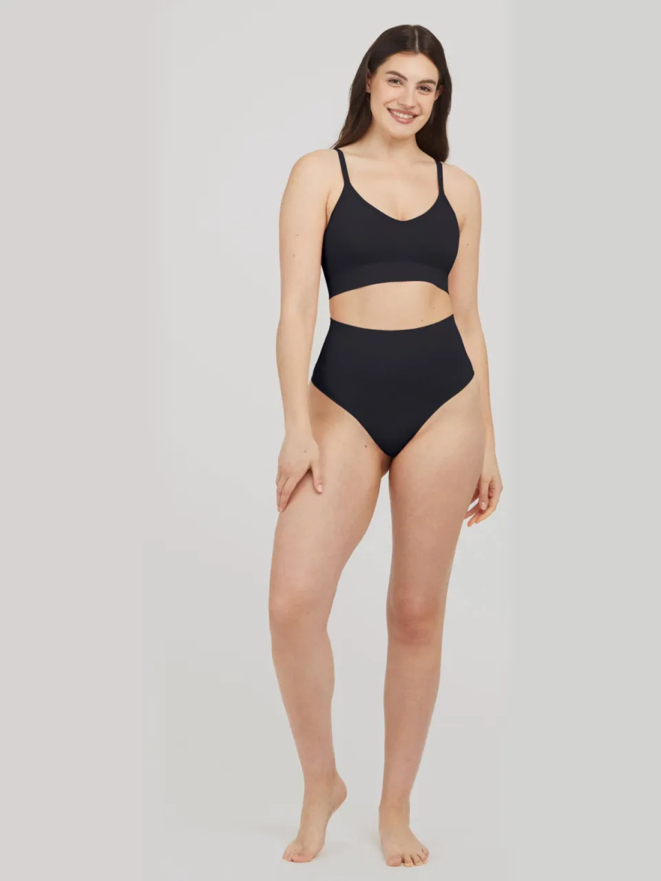 SPANX SPANXshape™ ExtraOrdinary seamless medium corrigerende string zwart
