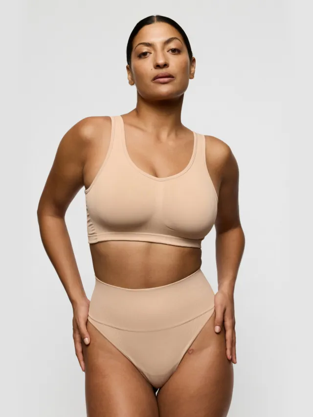 PrimaDonna medium corrigerende string Nudda lichtbeige