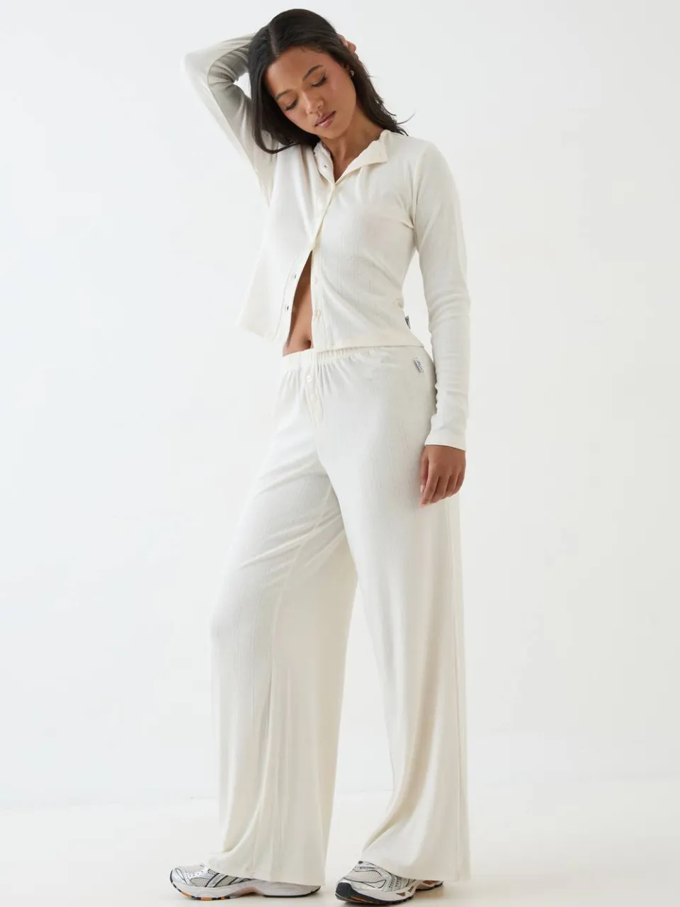 DSGN Studio Dames Dsgn Studio Pointelle Top Met Knoopsluiting En Lange Mouwen Crème