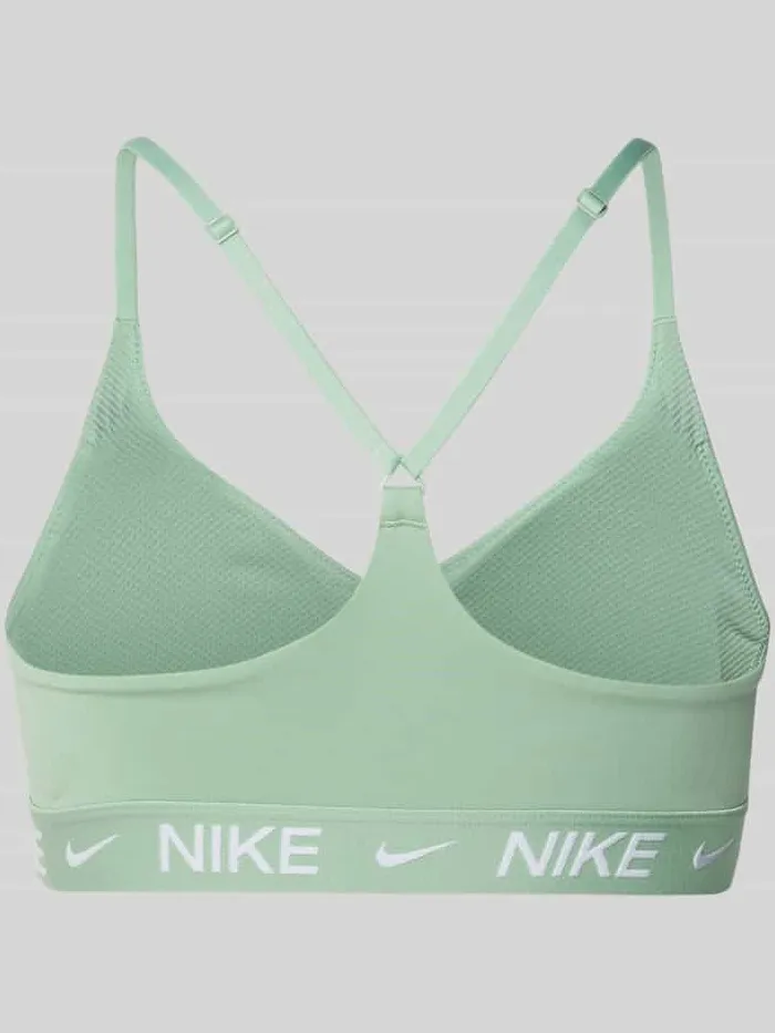 Nike slim fit sport-bh met logoprint model 'Indy' rietgroen, foto 2