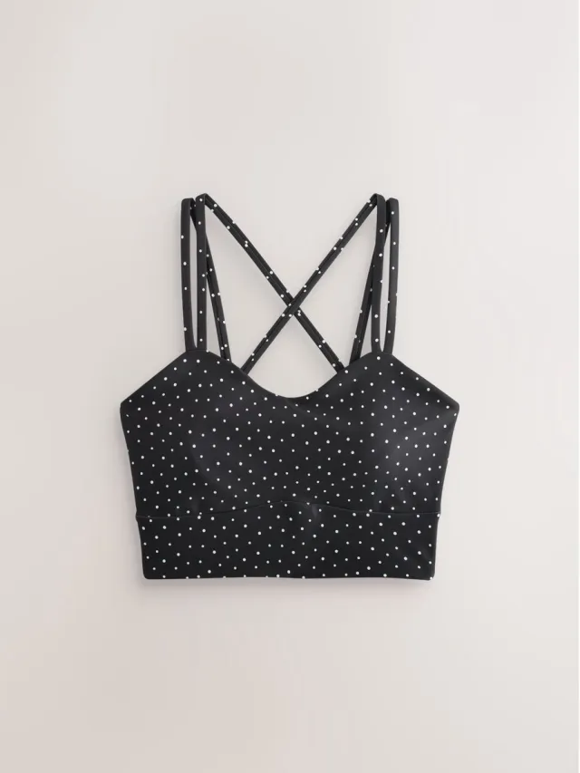 Next Dames - Active Power sportbeha met gekruiste bandjes aan de achterzijde - Zwart Polka Dot